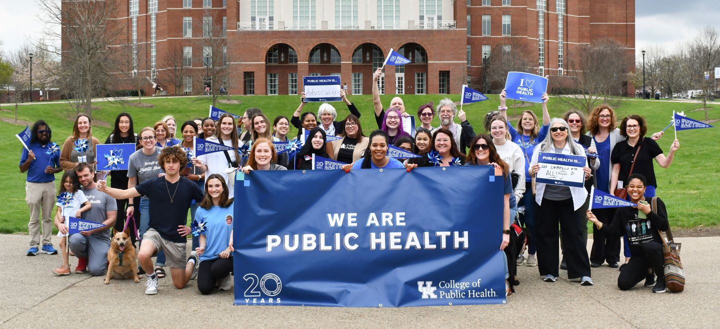 Public Health students gathered in front of building